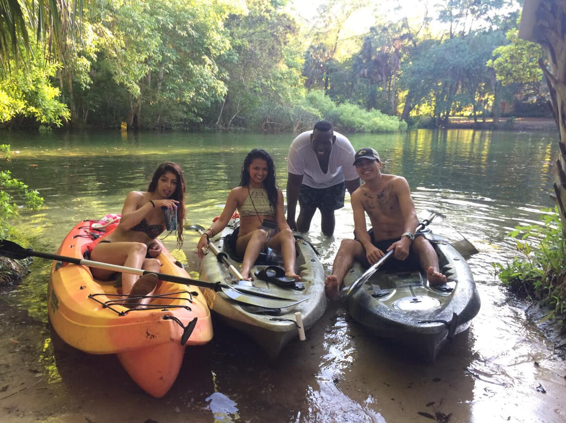 Friends kayaking